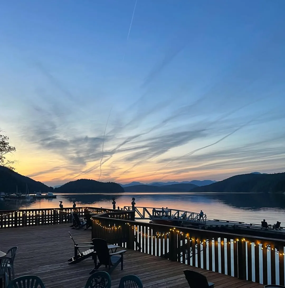 Sunset over Okeover Inlet from Desolation Sound Resort private dock, Sunshine Coast BC