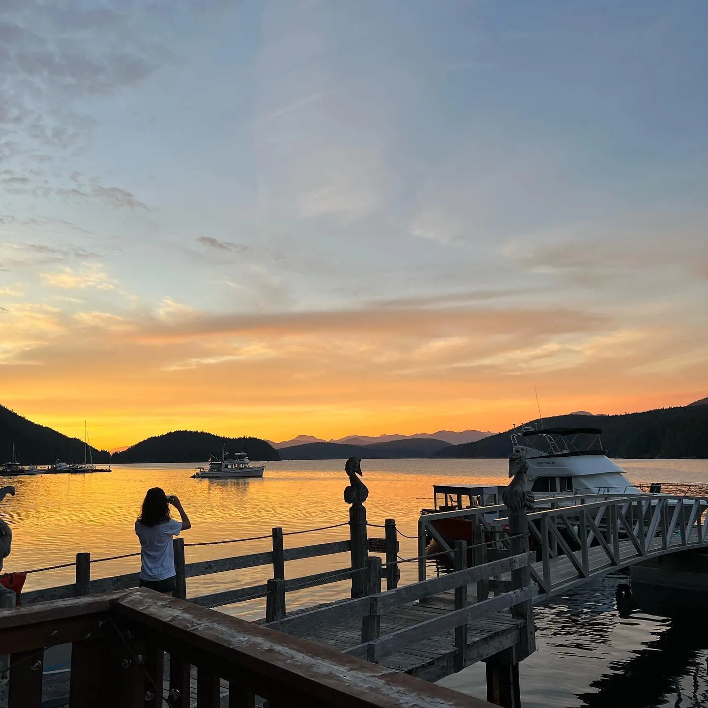 Private dock at Desolation Sound Resort at sunset